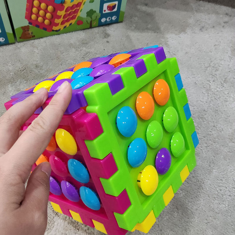 Large interlocking cube blocks, large mushroom-shaped pegs, educational toys for developing hands-on skills, and in various colors.